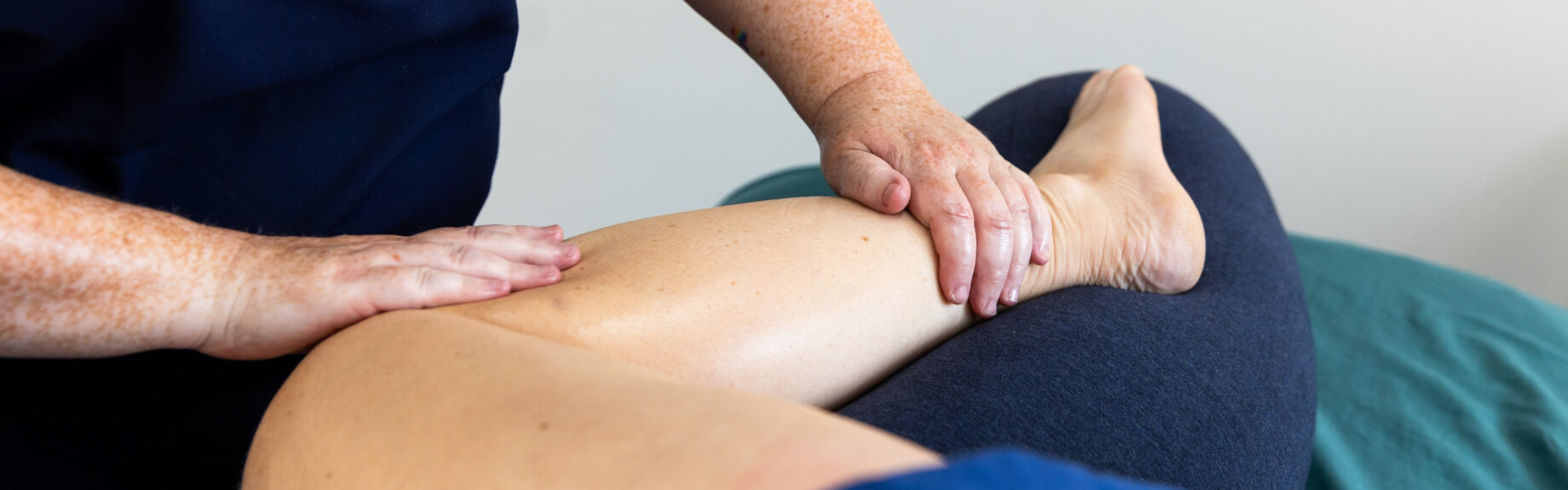 Pregnancy aromatherapy massage in progress. With Julia Walder massaging a pregnancy ladies lower legs using an aromatherapy oil blend