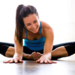 Holy Manigan yoga teacher in a yoga pose at Willow Grace Women's Wellbeing Hub